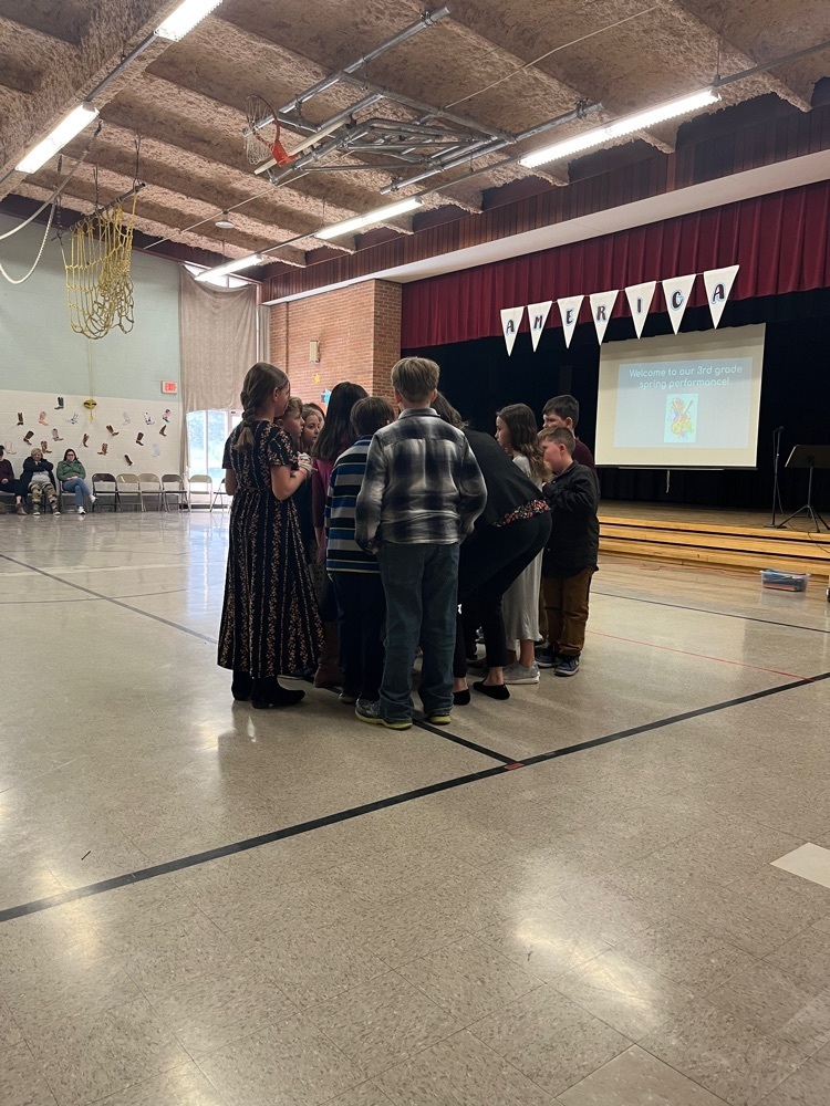 Huddling up for the next song
